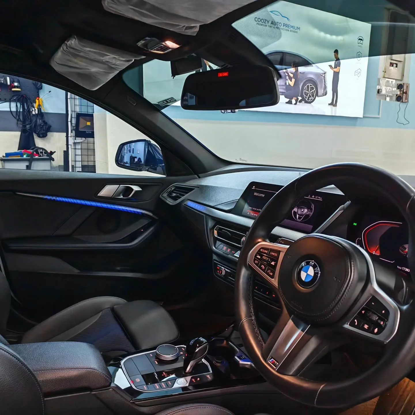 BMW 118i interior, looking out through the windscreen and front side window
